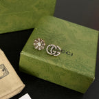 Asymmetrical Diamond Logo Stud Earrings