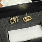 Fashionable hollow V earrings